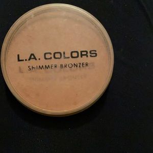 Never been used shimmer bronzer .